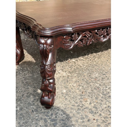 217 - highly carved Asian coffee table