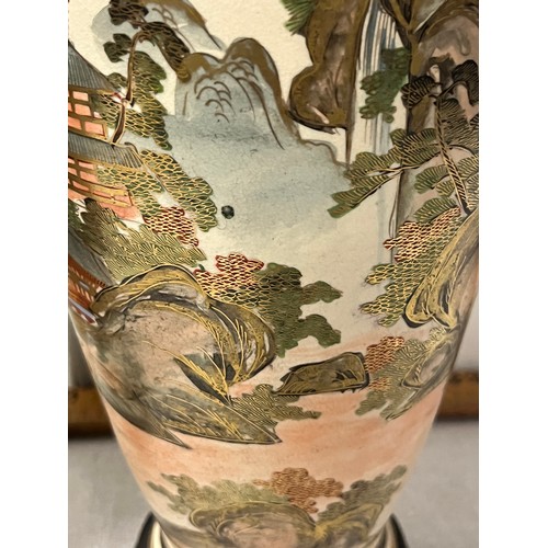 60 - Pair of signed Japanese satsuma vases on wooden stands possibly from the meiji period?
10