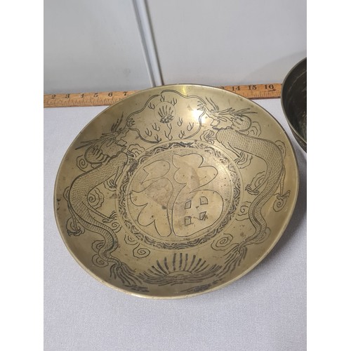 63 - 3 large Chinese brass bowls.