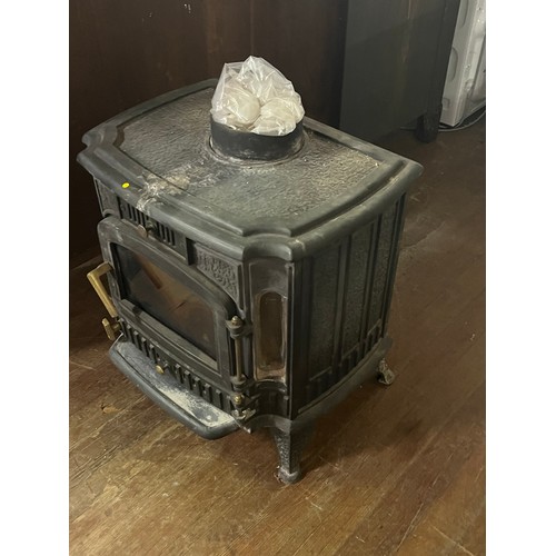 66 - Cast Iron wood burning stove model JA048 weighs 110kg