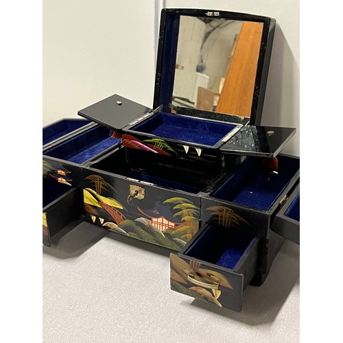 82 - large oriental lacquered jewellery box
36cm l