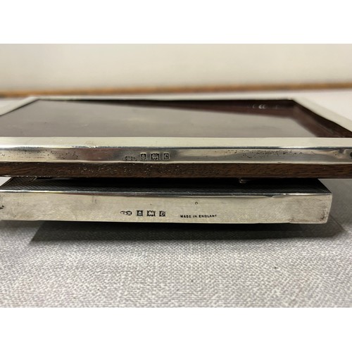 96 - 2 hallmarked silver photo frames
Largest 15cm x 10cm