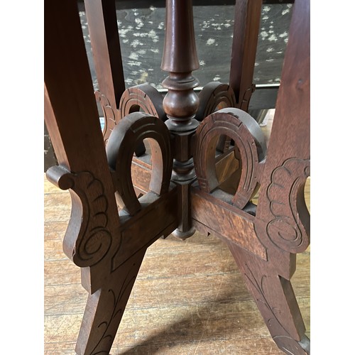 105 - antique marble top hall table with horse shoe design on metal casters
73cm l x 48cm x 75cm h