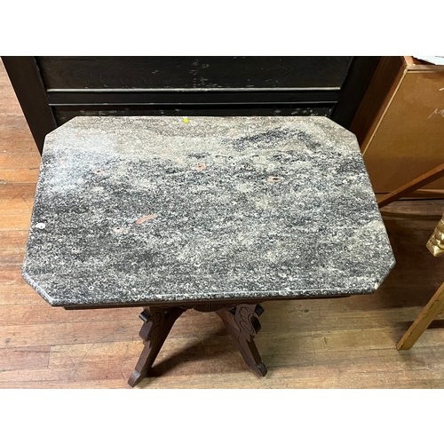 105 - antique marble top hall table with horse shoe design on metal casters
73cm l x 48cm x 75cm h