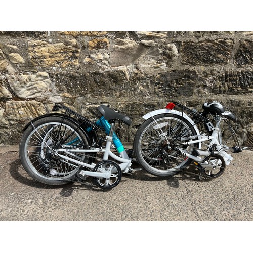 111 - A pair of compass folding bikes nearly new