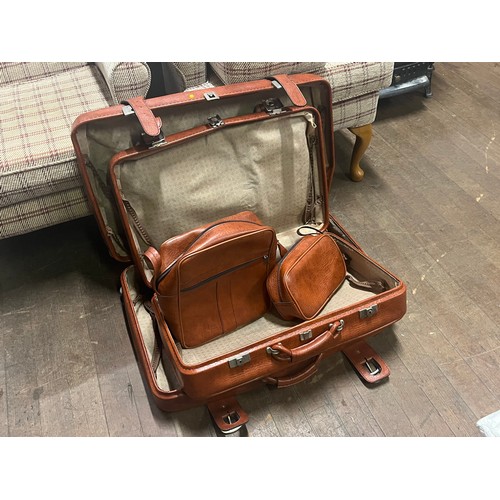 194 - Vintage 4 piece leather luggage set.