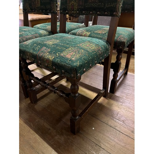 55 - 4 upholstered pub style chairs.