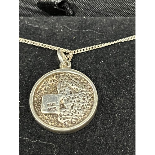 136 - silver hallmarked chain with celestial scene silver pendant