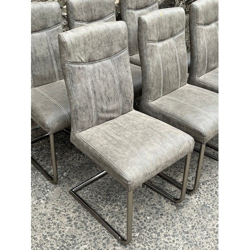 71 - A set of six leather & chrome dining chairs