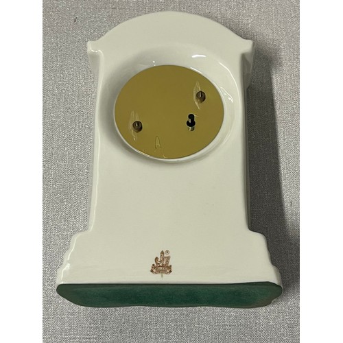 113 - Belleek pottery clock.
19cm h