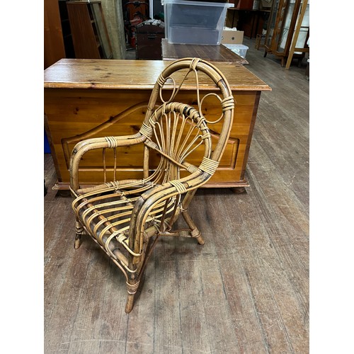 61 - Childs vintage rattan chair.