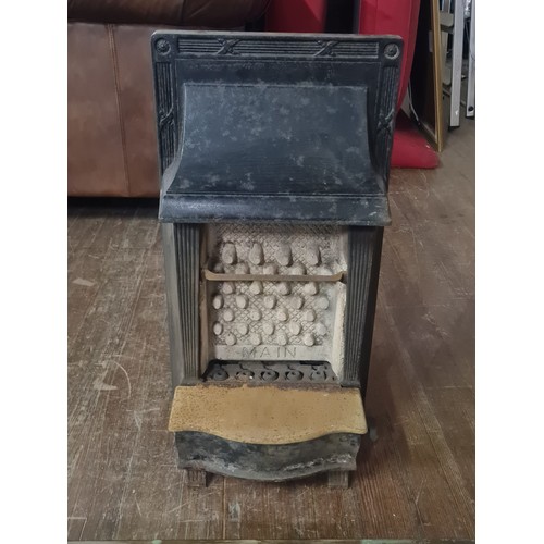 207 - 2 Early cast iron fires with celtic & art deco fenders.