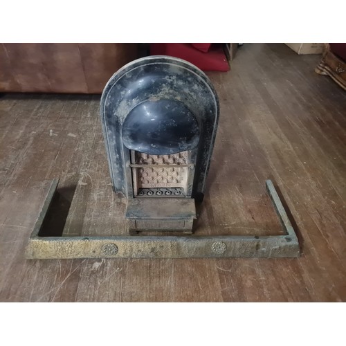 207 - 2 Early cast iron fires with celtic & art deco fenders.