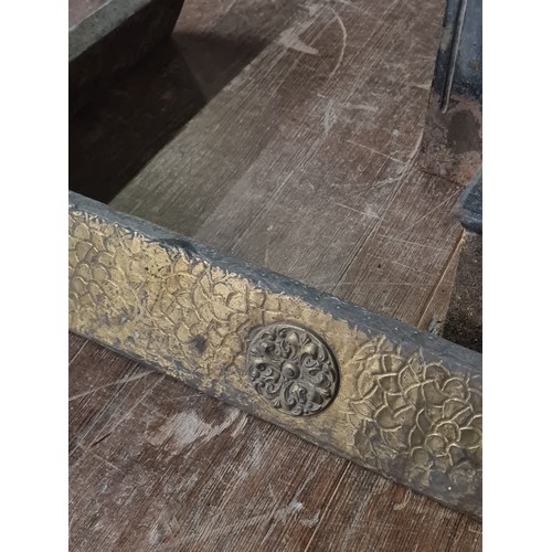 207 - 2 Early cast iron fires with celtic & art deco fenders.