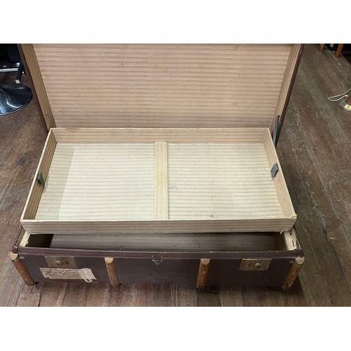 111 - large wood bound trunk