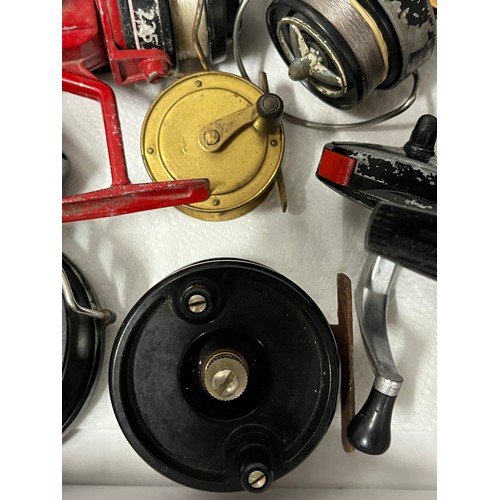 67 - 12 assorted fishing reels
