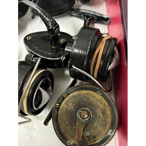 67 - 12 assorted fishing reels