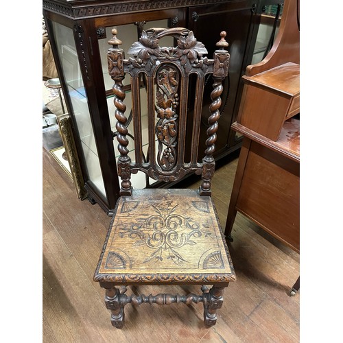 68 - Victorian high back heavily carved hall chair.