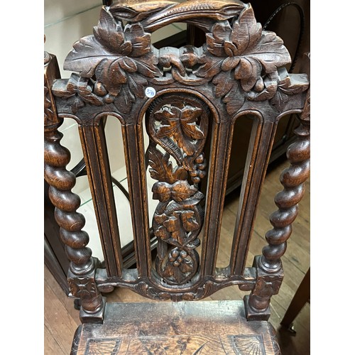 68 - Victorian high back heavily carved hall chair.