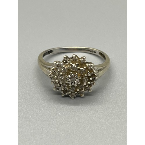 94 - 9ct white gold & diamond cluster ring 2.5grams