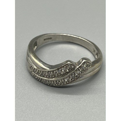 97 - 9ct white gold & diamond cluster ring 3.6g
