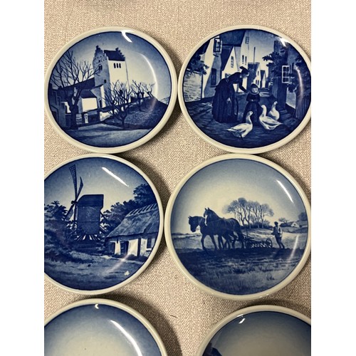 71 - 13 miniature blue & white Royal Copenhagen plates.