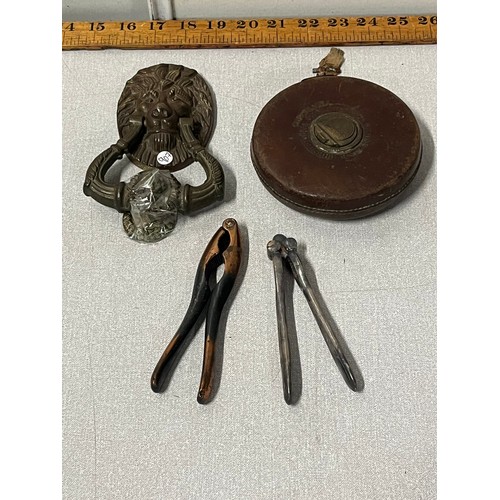 72 - Vintage lion door knocker, tape measure & 2 sets of nutcrackers.