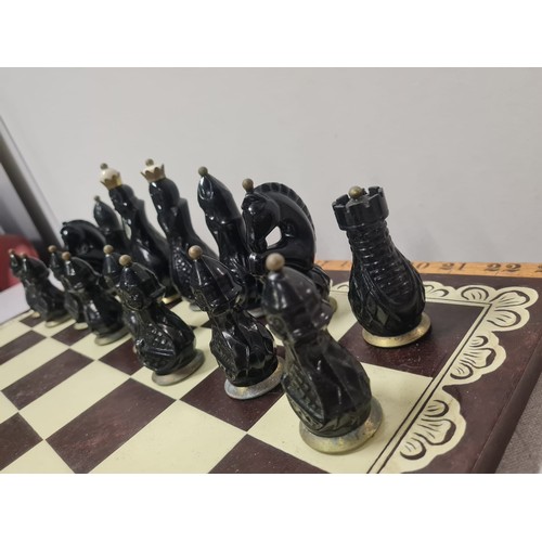 110 - Vintage Soviet carbolite/bakelite black & white chess set USSR to include board.
Tallest 11cm