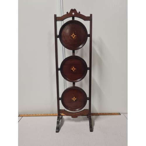 125 - Inlaid 3 tier folding cake table.
85cm h