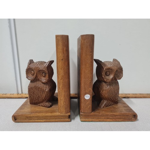 127 - Pair of carved owl bookends.
19cm h
