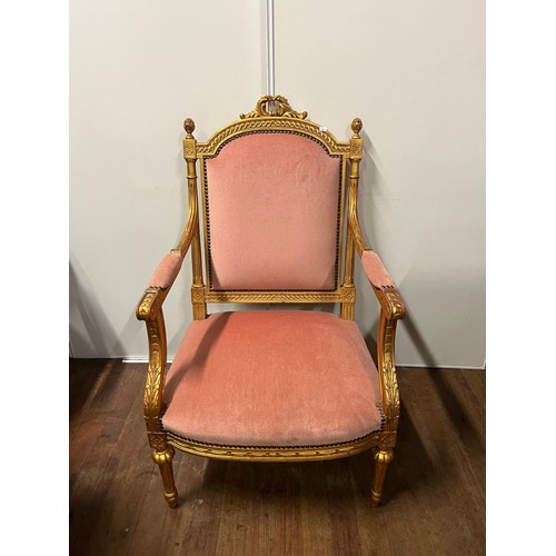 66 - Regency Style lounge arm chair finished with gold leaf to the wood work.