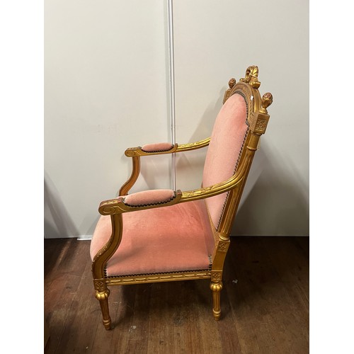 66 - Regency Style lounge arm chair finished with gold leaf to the wood work.