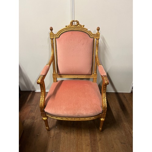 67 - Regency Style lounge arm chair finished with gold leaf to the wood work.
