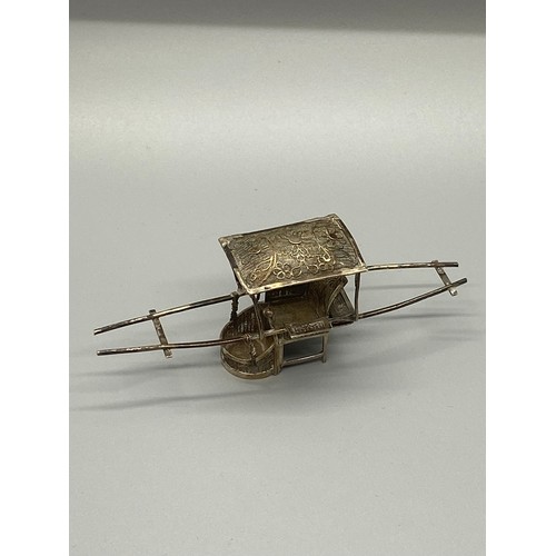 40 - silver chinese rickshaw