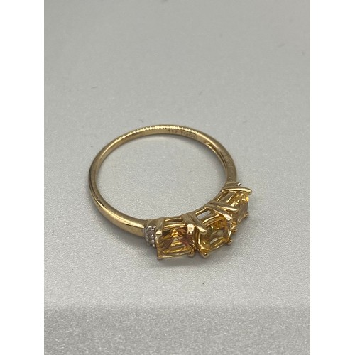 48 - 10ct gold yellow gem set ring