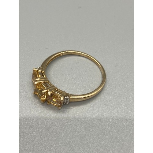 48 - 10ct gold yellow gem set ring