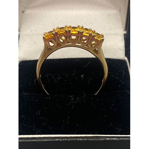 51 - 9ct gold ring with 5 yellow stones
3.9g