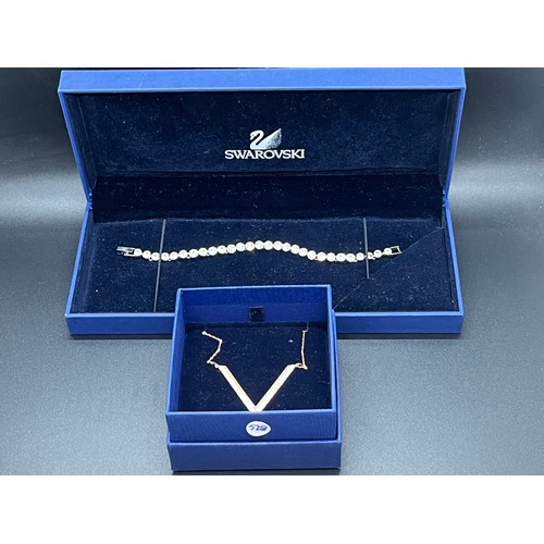 90 - Swarovksi V shaped necklace & tennis bracelet both boxed.