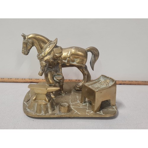 172 - Heavy brass farrier at work ornament
25cm long