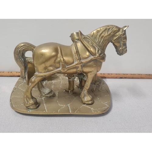 172 - Heavy brass farrier at work ornament
25cm long