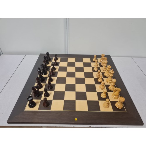 5 - Large good quality chess set with highly glossed wooden weighted pieces.
Board 60cm x 60cm
king 9.5c... 