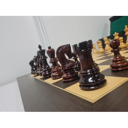 5 - Large good quality chess set with highly glossed wooden weighted pieces.
Board 60cm x 60cm
king 9.5c... 