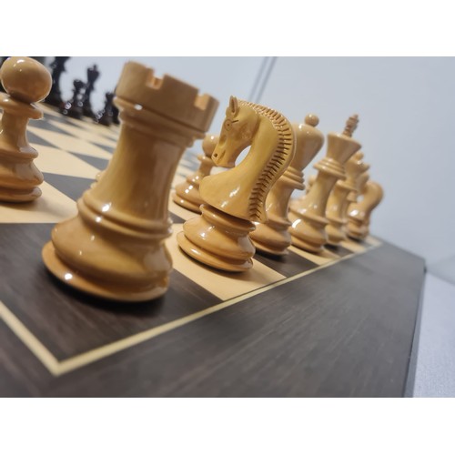 5 - Large good quality chess set with highly glossed wooden weighted pieces.
Board 60cm x 60cm
king 9.5c... 