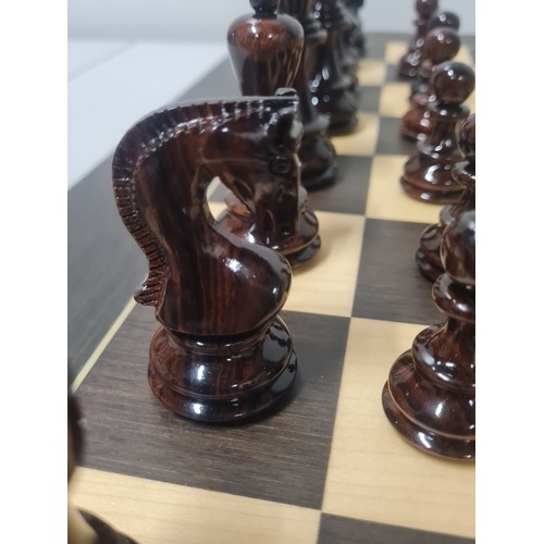 5 - Large good quality chess set with highly glossed wooden weighted pieces.
Board 60cm x 60cm
king 9.5c... 