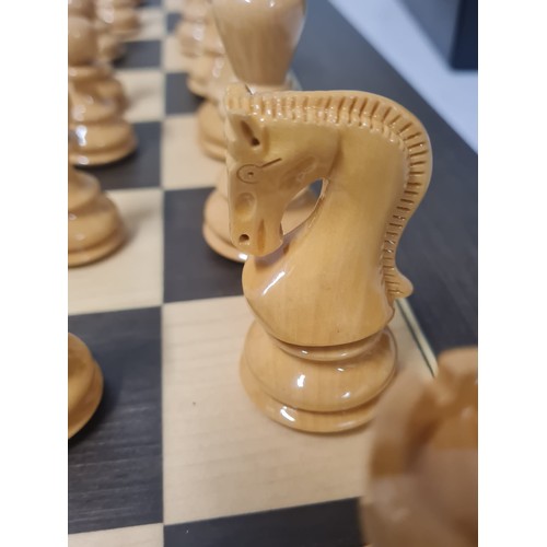 5 - Large good quality chess set with highly glossed wooden weighted pieces.
Board 60cm x 60cm
king 9.5c... 