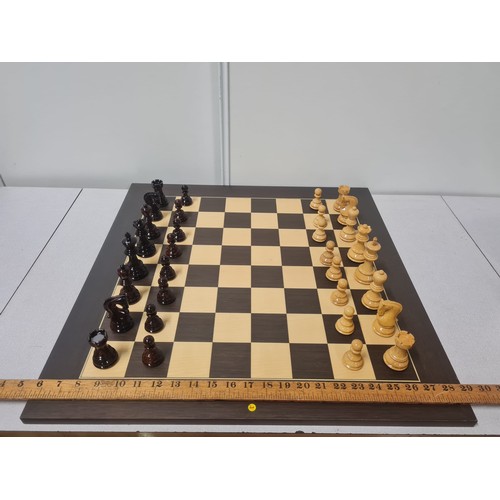 5 - Large good quality chess set with highly glossed wooden weighted pieces.
Board 60cm x 60cm
king 9.5c... 