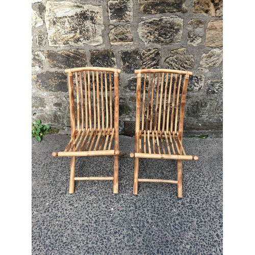 13 - a pair of vintage folding bamboo chairs