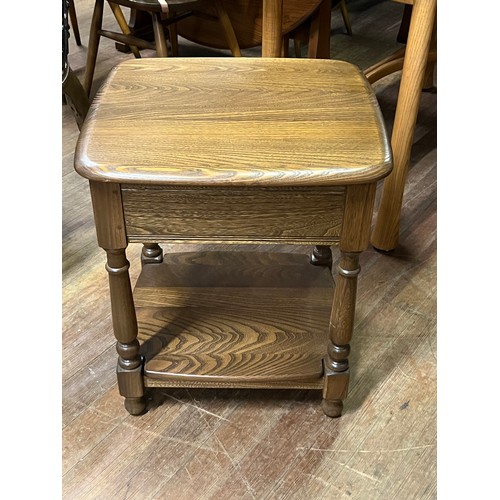 107 - ercol solid elm bedside chest table