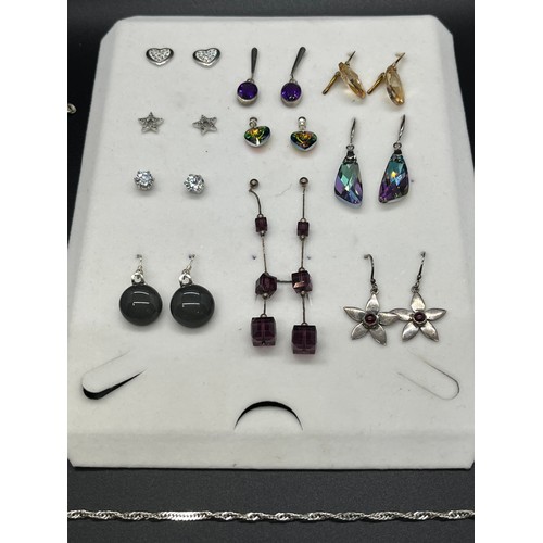 44 - selection of silver jewellery to include earings , silver bracelets & chain & pendants etc