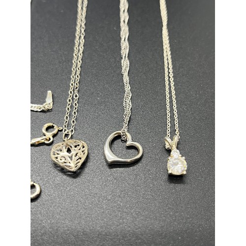 44 - selection of silver jewellery to include earings , silver bracelets & chain & pendants etc